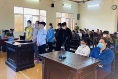 Các bị cáo tại phiên tòa. (Ảnh: Tuấn Kiệt/TTXVN)