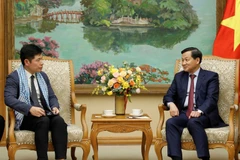 Phó Thủ tướng Lê Minh Khái tiếp Tổng Giám đốc kiêm đồng sáng lập Tập đoàn Grab toàn cầu Anthony Tan. (Ảnh: An Đăng/TTXVN)