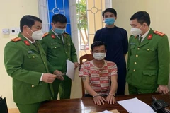 Nguyễn Văn Minh tại thời điểm bị bắt giữ. (Nguồn: Baophapluat.vn)