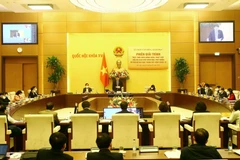 Quang cảnh phiên giải trình. (Ảnh: An Đăng/TTXVN)