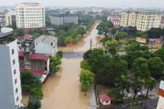 Một số tuyến phố chính bị ngập nước tại thành phố Vĩnh Yên. (Ảnh: Hoàng Hùng/TTXVN)