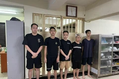 Nhóm đối tượng tại cơ quan công an. (Ảnh: Công an Hà Nội)