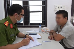 Tài xế Phan Văn D. tại cơ quan công an. (Nguồn: Cand)
