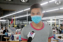 Anh Nguyễn Đức Chính - người dũng cảm cứu nữ sinh đang nguy hiểm đến tính mạng trên sông Ninh Cơ (huyện Hải Hậu, tỉnh Nam Định). (Ảnh: Văn Đạt/TTXVN)