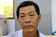 Nghi can Bùi Tấn Quang tại cơ quan điều tra. (Ảnh: TTXVN phát)