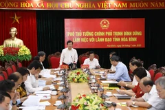 Phó Thủ tướng Trịnh Đình Dũng phát biểu tại buổi làm việc với lãnh đạo tỉnh Hòa Bình. (Ảnh: Văn Điệp/TTXVN)