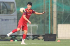 Tiền vệ Lương Xuân Trường gặp chấn thương và bỏ dở buổi tập chiều 30/9 với tuyển Việt Nam. (Ảnh: Hồ Hoàng Hải)