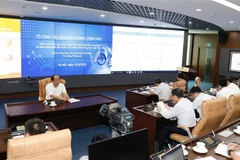 Bộ trưởng, Chủ nhiệm Văn phòng chính phủ, Tổ trưởng Tổ công tác của Thủ tướng Chính phủ Mai Tiến Dũng chủ trì buổi làm việc. (Ảnh: Dương Giang/TTXVN)