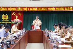 Đại tá Đỗ Thanh Bình, Phó Cục trưởng Cục Cảnh sát giao thông, Bộ Công an thông tin về sự cần thiết, những điểm mới, tiến bộ của Luật Bảo đảm trật tự an toàn giao thông đường bộ. (Ảnh: Doãn Tấn/TTXVN)