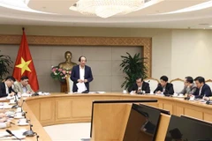 Bộ trưởng, Chủ nhiệm Văn phòng Chính phủ Mai Tiến Dũng phát biểu kết luận buổi làm việc. (Ảnh: Văn Điệp/TTXVN)