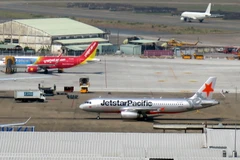 Các hãng hàng không Việt Nam tại sân bay Tân Sơn Nhất. (Ảnh: Hoàng Hải/TTXVN)