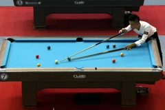 Các cơ thủ thi đấu các nội dung vòng bảng sau lễ khai mạc. (Ảnh: Nguyễn Thanh Liêm/TTXVN) 