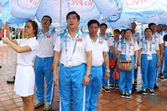 Đoàn Thể thao Việt Nam tại buổi lẽ thượng cờ. (Ảnh: Quốc Khánh/TTXVN)