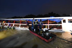 Cảnh sát điều tra hiện trường vụ việc. (Nguồn: Getty)