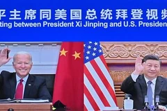 Tổng thống Mỹ Joe Biden (trái) và Chủ tịch Trung Quốc Tập Cận Bình tại hội nghị thượng đỉnh theo hình thức trực tuyến, Bắc Kinh (Trung Quốc) ngày 16/11/2021. (Ảnh: THX/TTXVN)
