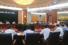 Một cuộc họp thảo luận phương án tiếp nhận và tiêm vaccine phòng COVID-19 của Ủy ban Nhân dân thành phố Hải Phòng. (Ảnh: Minh Thu/TTXVN)
