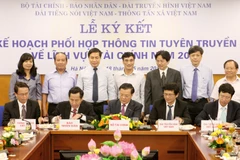 TTXVN ký Kế hoạch phối hợp thông tin tuyên truyền về tài chính