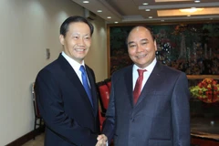 Phó Thủ tướng Nguyễn Xuân Phúc tiếp ông Bành Thanh Hoa. (Ảnh: An Đăng/TTXVN)