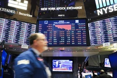 Bảng tỷ giá chứng khoán tại Sàn giao dịch chứng khoán New York, Mỹ. (Ảnh: THX/TTXVN)