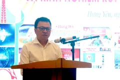 Ông Lê Quốc Minh, Ủy viên Trung ương Đảng, Tổng Biên tập Báo Nhân dân, Phó Trưởng ban Tuyên giáo Trung ương, Chủ tịch Hội Nhà báo Việt Nam, phát biểu tại hội thảo. (Ảnh: Đỗ Huyền/TTXVN)