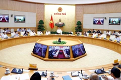 Thủ tướng Nguyễn Xuân Phúc phát biểu tại phiên họp. (Ảnh: Thống Nhất/TTXVN)