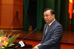 Bộ trưởng Bộ Tài chính Đinh Tiến Dũng. (Ảnh: Phạm Hậu/TTXVN)