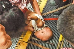 Trung Quốc gặp ác mộng thang máy, thêm một cô gái bị kẹt đứt đầu