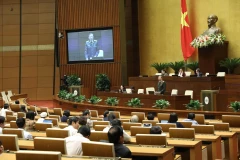 Đại tướng Tô Lâm, Bộ trưởng Bộ Công an giải trình ý kiến của đại biểu Quốc hội nêu. (Ảnh: Văn Điệp/TTXVN)