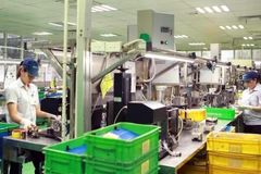 Sản xuất tại Công ty TNHH Công nghiệp Strong Way, Khu công nghiệp Khai Quang, thành phố Vĩnh Yên, tỉnh Vĩnh Phúc. (Ảnh: Hoàng Hùng/TTXVN)