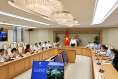 Bộ trưởng, Chủ nhiệm Văn phòng Chính phủ Mai Tiến Dũng chủ trì cuộc họp. (Ảnh: Dương Giang/TTXVN)