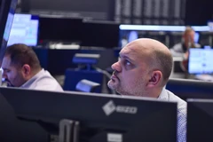 Hoạt động tại sàn giao dịch chứng khoán Frankfurt, Đức. (Ảnh: THX/TTXVN)