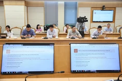 Trang thông tin hướng dẫn nộp thuế cá nhân và doanh nghiệp trên Cổng dịch vụ công Quốc gia. (Ảnh: Dương Giang/TTXVN)