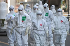 Nhân viên y tế làm nhiệm vụ tại bệnh viện Dongsan, thành phố Daegu, Hàn Quốc ngày 29/3/2020. (Ảnh: Yonhap/TTXVN)