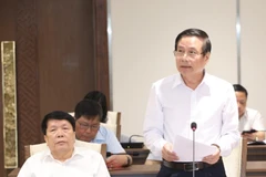 Chủ tịch Hội Văn học nghệ thuật Hà Nội Trần Quốc Chiêm đóng góp ý kiến vào Dự thảo Báo cáo chính trị. (Ảnh: Văn Điệp/TTXVN)