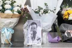 14 người ở tỉnh Hồ Bắc của Trung Quốc, bao gồm cả bác sỹ Lý Văn Lượng, được công nhận là liệt sỹ vì đã hy sinh mạng sống của họ trong cuộc chiến chống dịch COVID-19. (Nguồn: EPA/EFE)