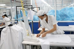 80% doanh nghiệp dệt may chịu ảnh hưởng của dịch COVID-19. Ảnh minh họa. (Nguồn: Hoàng Nguyên/TTXVN)