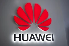 Biểu tượng Huawei tại một cửa hàng ở Bắc Kinh, Trung Quốc. (Ảnh: AFP/TTXVN)