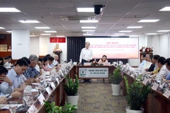 Quang cảnh buổi gặp gỡ. (Ảnh: Tiến Lực/TTXVN)