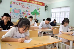 Thí sinh dự thi tại điểm thi Trường Trung học phổ thông Than Uyên, huyện Than Uyên tỉnh Lai Châu trong kỳ thi THPT quốc gia 2019. Ảnh minh họa: (Quý Trung/TTXVN)