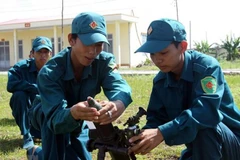 Luật Dân quân tự vệ (sửa đổi) sẽ có những quy định mới về tuyển chọn tham gia dân quân tự vệ. (Ảnh minh hoạ: Trọng Đức/TTXVN)