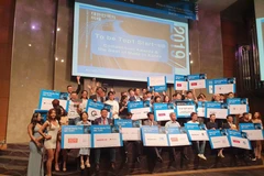 Các doanh nghiệp xuất sắc được bình chọn tại MIK. (Ảnh: PV/Vietnam+)