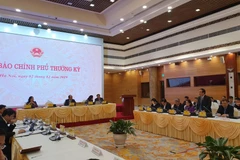 Lãnh đạo thành phố Hà Nội trả lời về việc tính giá nước sạch. (Ảnh: PV/Vietnam+)