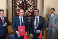 Ký kết bản ghi nhớ trong lĩnh vực giúp việc gia đình. (Ảnh: PV/Vietnam+)