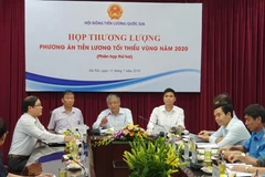 Hội đồng Tiền lương quốc gia họp bàn mức tăng lương tối thiểu vùng năm 2020. (Ảnh: PV/Vietnam+)