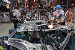 Điện tử, máy tính và linh kiện chiếm 24,5% tổng kim ngạch nhập khẩu của cả nước trong 11 tháng. (Ảnh: TTXVN)