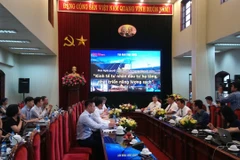 Toàn cảnh tọa đàm về phát triển năng lượng sạch do Báo Nhân dân tổ chức. (Ảnh: Đức Duy/Vietnam+)