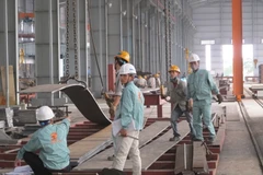 Bộ Công Thương sẽ đồng hành cùng doanh nghiệp, tháo gỡ khó khăn đẩy mạnh sản xuất và xuất khẩu. (Ảnh: Đức Duy/Vietnam+)