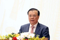 Bộ trưởng Bộ Tài chính Đinh Tiến Dũng phát biểu tại Hội nghị Chính phủ với địa phương sáng 29/12. (Ảnh: TTXVN)