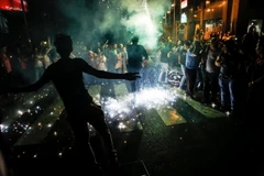 Người dân Iran ăn mừng sau thỏa thuận hạt nhân lịch sử vừa đạt được. (Nguồn: The New York Times) 