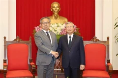 Thường trực Ban Bí thư Trần Quốc Vượng tiếp ngài Yamada Takio, Đại sứ Nhật Bản đến chào xã giao nhân dịp đảm nhiệm công tác mới tại Việt Nam. (Ảnh: Phương Hoa/TTXVN)